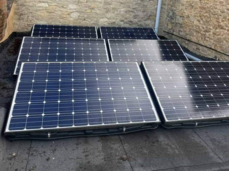 Solar panels on a flat roof after cleaning in Manchester